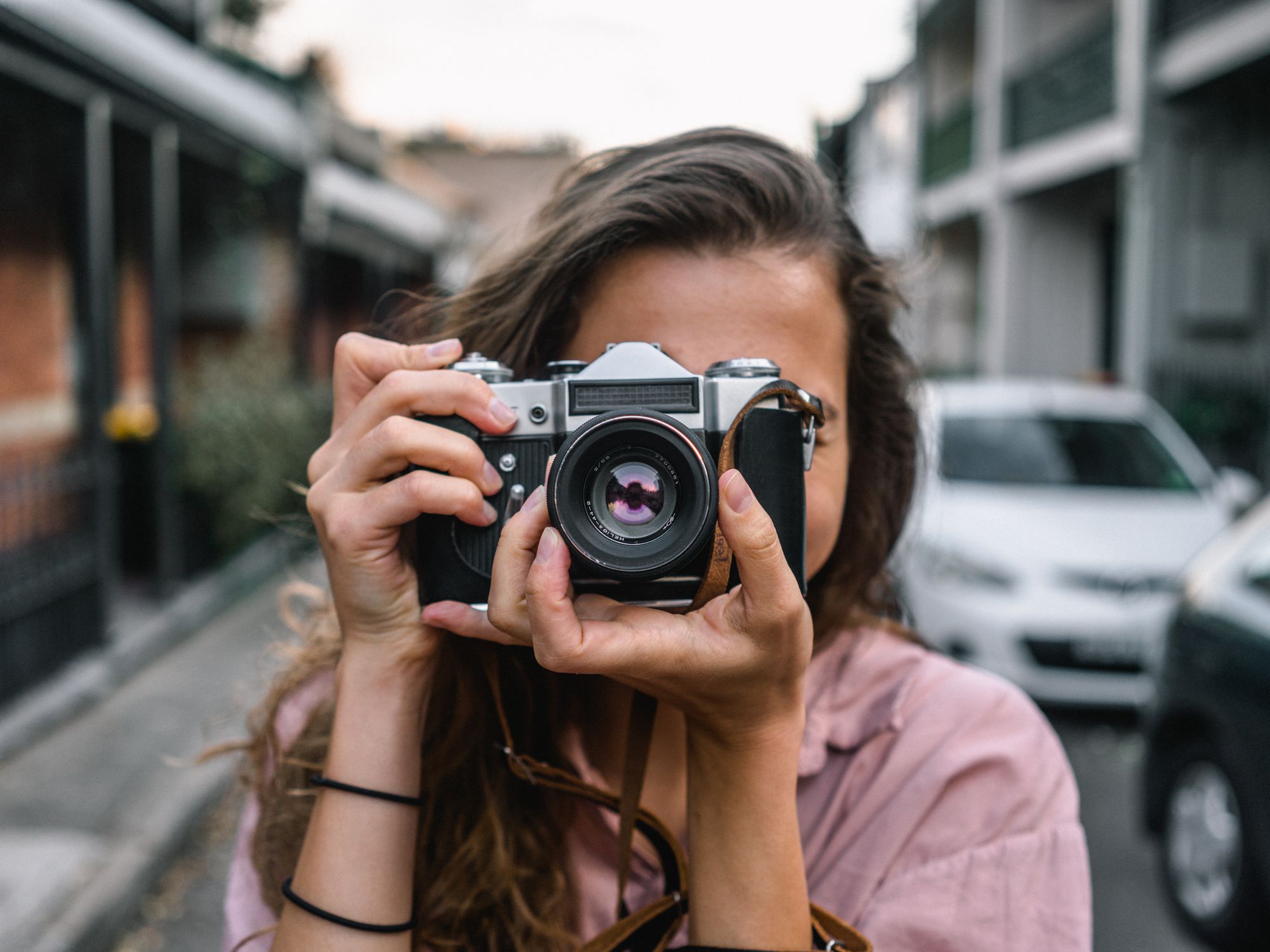 Photo by Matt Hardy: https://www.pexels.com/photo/woman-using-slr-camera-2179205/